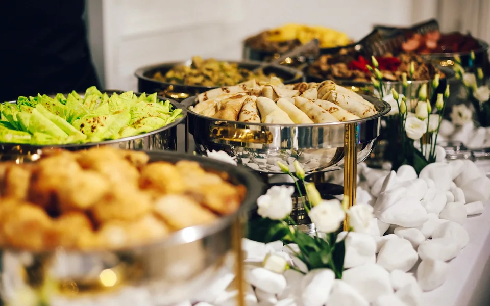 Buffet dishes arranged for a catered event.