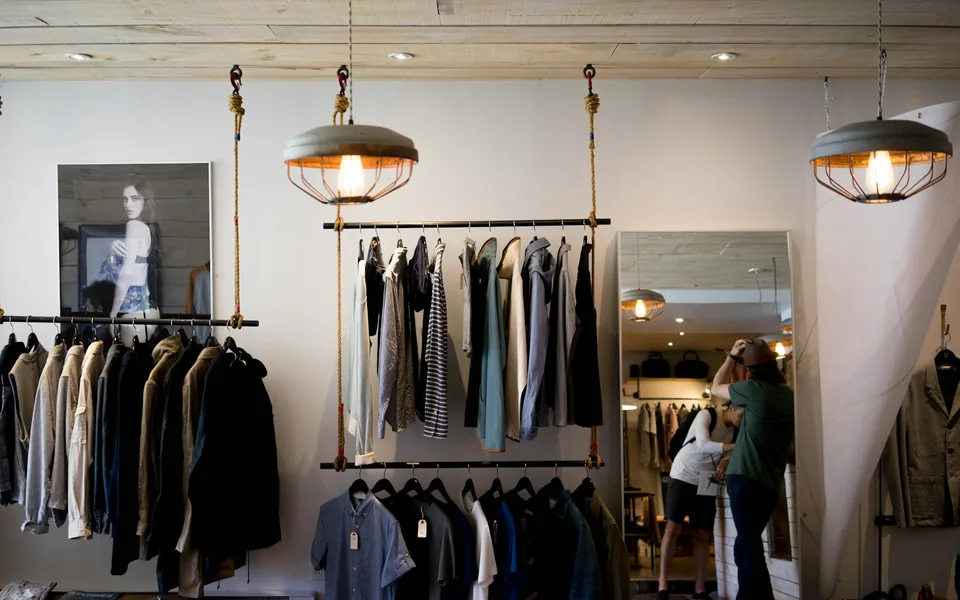 Clothing racks inside a boutique.