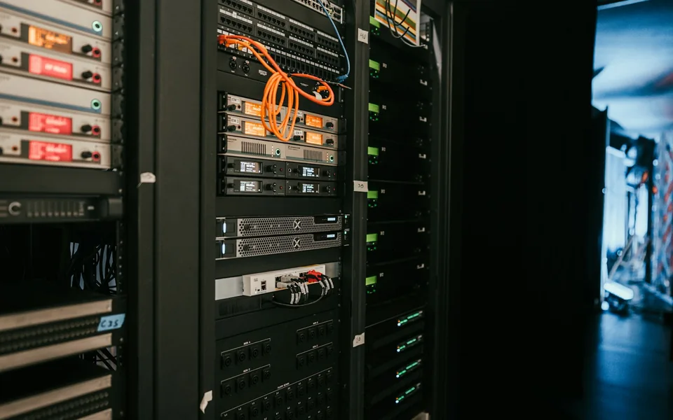 Rows of server equipment inside a data centre.